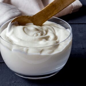 Thick creamy Thermomix yoghurt made at home from a few simple ingredients.