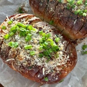 Sourdough garlic bread topped with chopped chives