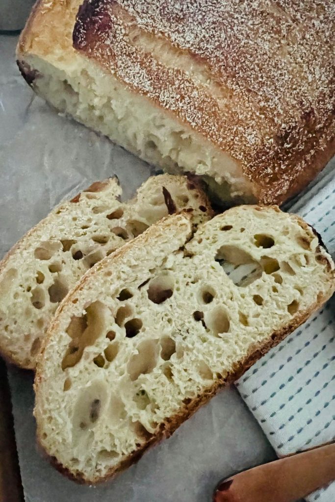 Sourdough bread made with yeast water. The bread has been sliced to display the immature and under fermented crumb the starter has produced.